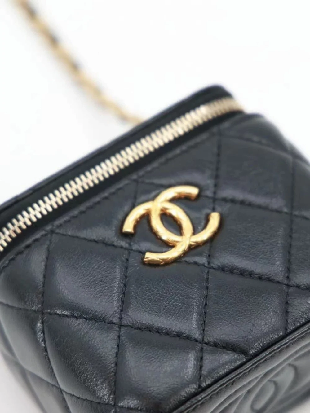 CHANEL Black Quilted Lambskin Mini Vanity Case with Gold Carving CC